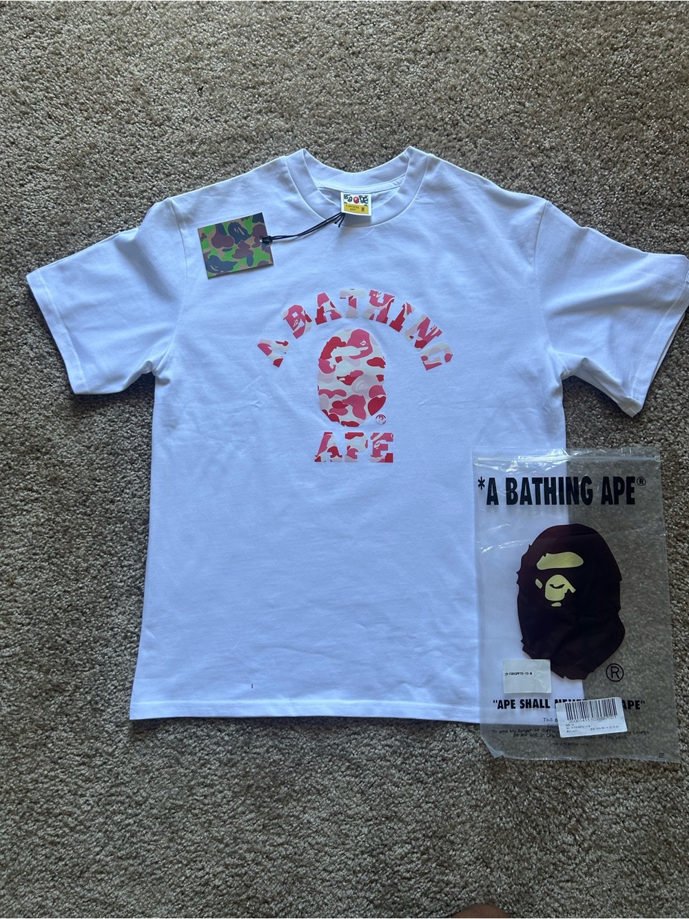 A Bathing Ape Mens White Tee with Pink Camo Logo